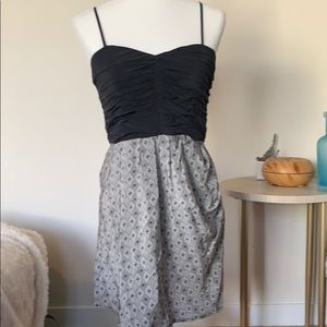 Flattering still cocktail dress with fitted bodice